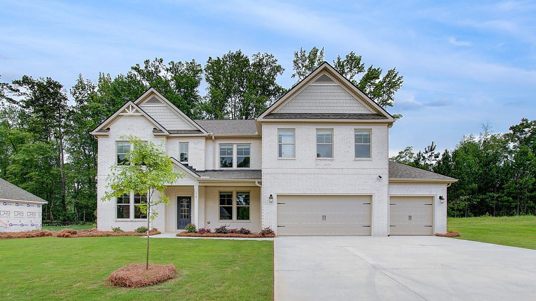 Front exterior of a home in the Cambria at Traditions community, located in Hampton, GA (Image 10).