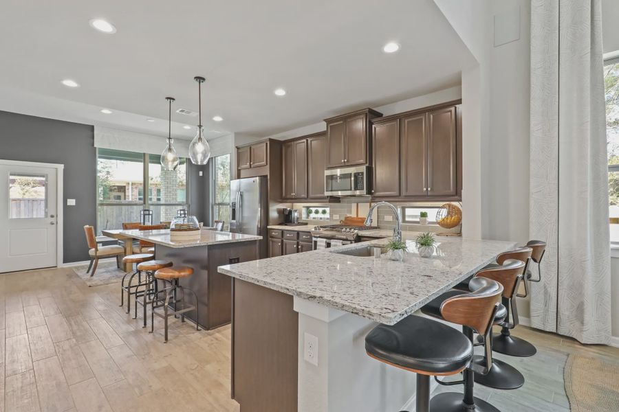 Furnished interior in a model home at The Woodlands Hills in Willis (Image 5).
