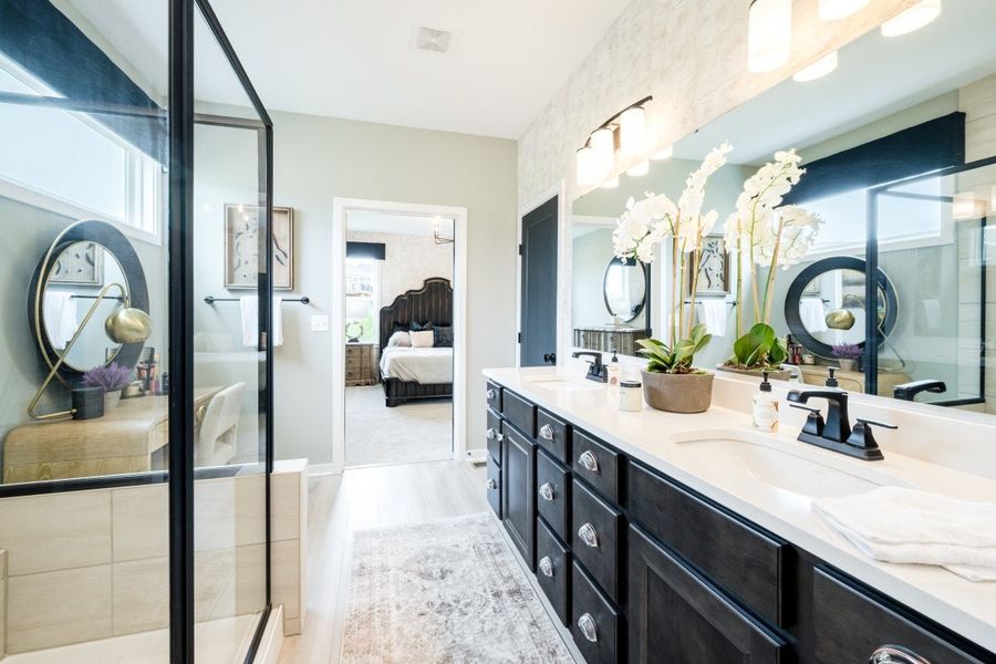 Furnished interior in a model home at Breakfast Point East in Panama City Beach (Image 51).