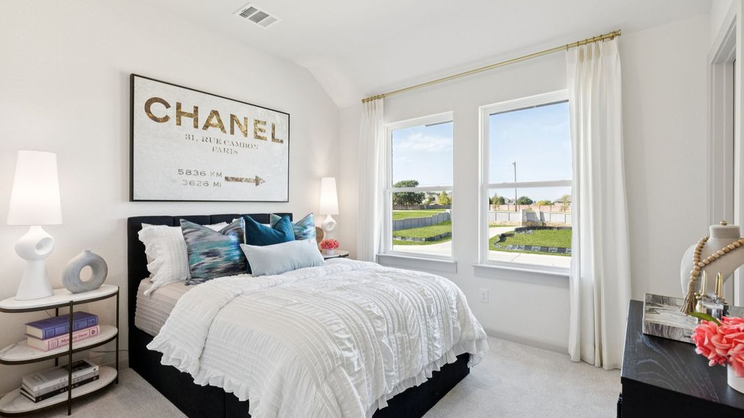 Furnished interior in a model home at Painted Tree - Woodland North in McKinney (Image 29).