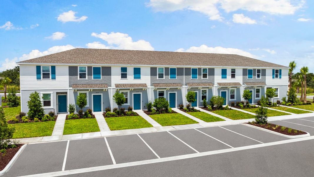 Front exterior of a home in the The Towns at Firethorn community, located in Parrish, FL (Image 5).