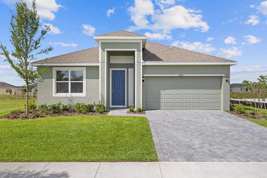 Front exterior of a home in the Tarpon Bay community, located in Haines City, FL (Image 12).
