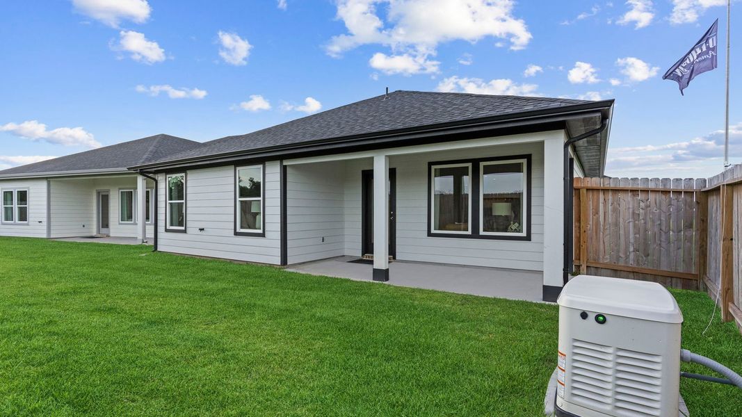 Front exterior of a home in the Sorrento community, located in Richmond, TX (Image 2).