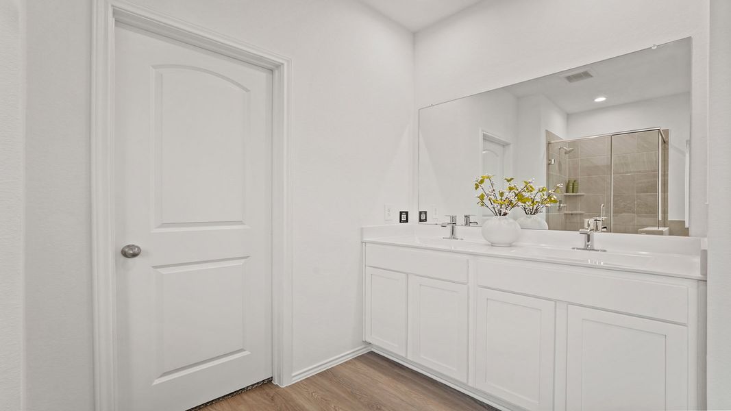 Furnished interior in a model home at Newport Pointe in Crosby (Image 24).