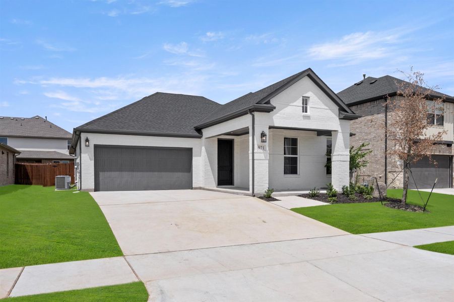 Front exterior of a home in the View at the Reserve 50s community, located in Mansfield, TX (Image 3).