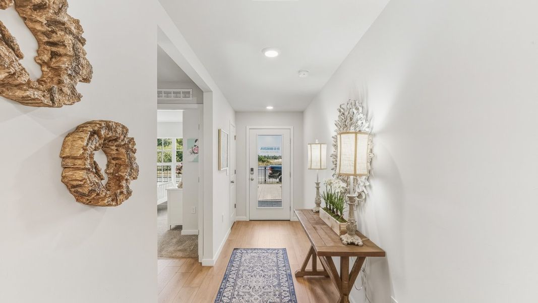 Furnished interior in a model home at Coral Lakes - Tradition & Express in Punta Gorda (Image 6).