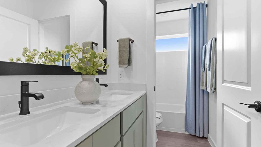 Furnished interior in a model home at Davis Harbor in League City (Image 23).