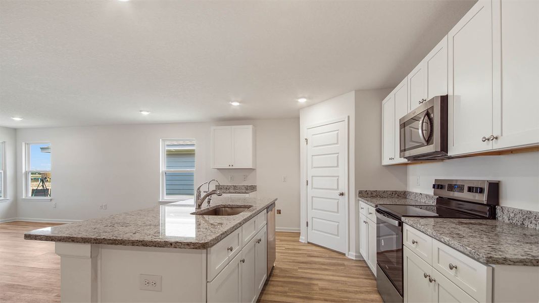 Furnished interior in a model home at Owl's Head Farms in Freeport (Image 7).