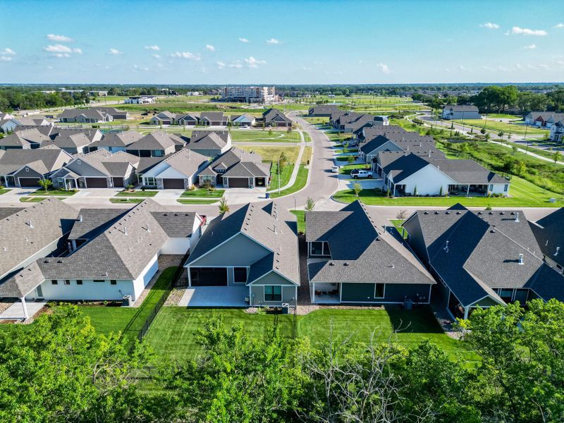 Aerial view of the The Courtyards at The Heritage community in Andover, KS, showing layout and nearby surroundings (Image 21). Aerial view of the The Courtyards at The Heritage community in Andover, KS, showing layout and nearby surroundings (Image 21).
