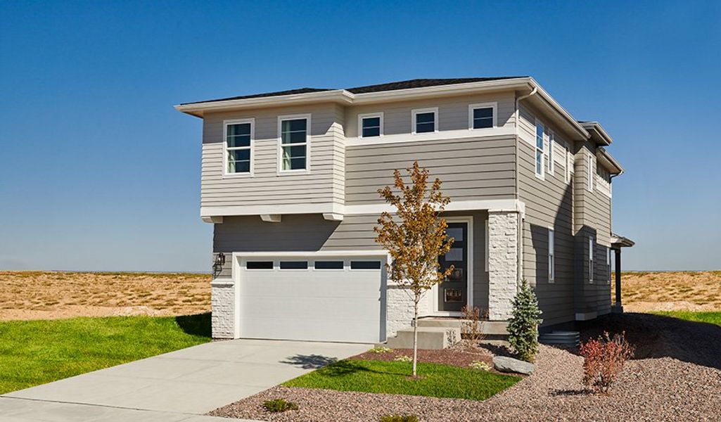 Front exterior of a home in the The Trails at Aspen Ridge community, located in Colorado Springs, CO (Image 2). Front exterior of a home in the The Trails at Aspen Ridge community, located in Colorado Springs, CO (Image 2).