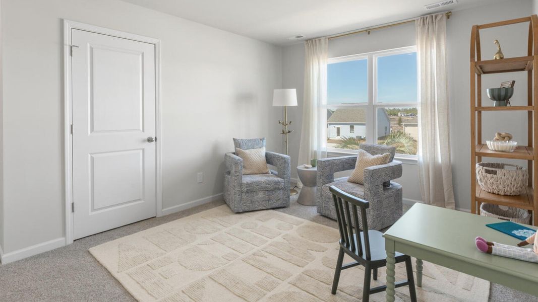 Furnished interior in a model home at The Grove at Blake Farm in Wilmington (Image 34). Furnished interior in a model home at The Grove at Blake Farm in Wilmington (Image 34).