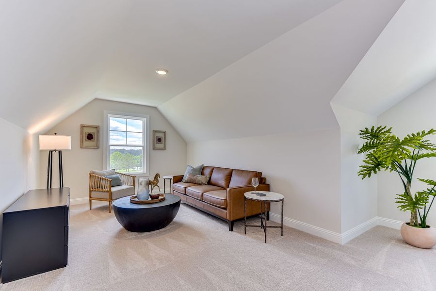 Upper-level bonus rooms offer flexible second living areas, providing additional space for relaxation, entertainment, or work Upper-level bonus rooms offer flexible second living areas, providing additional space for relaxation, entertainment, or work