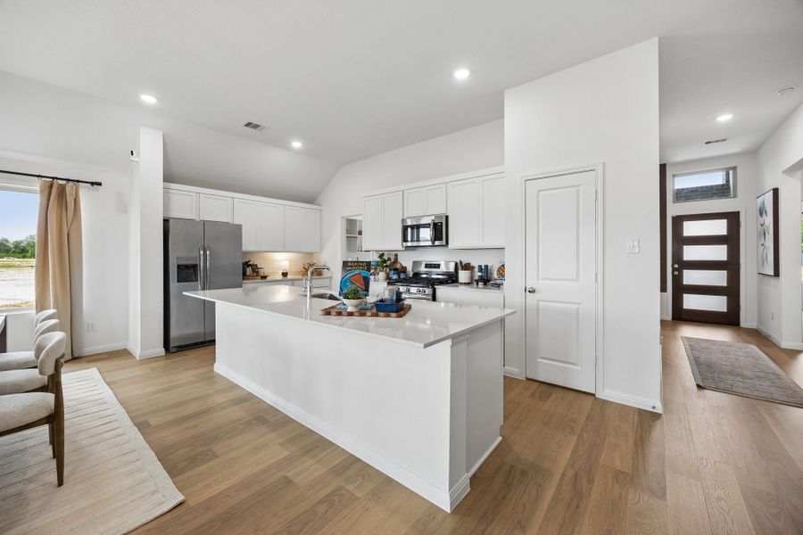 Kitchen in the Diamond Model Home by Trophy Signature Homes