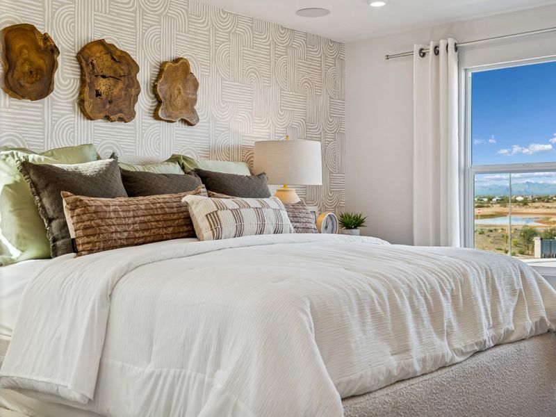 A bed with pillows and pillows.