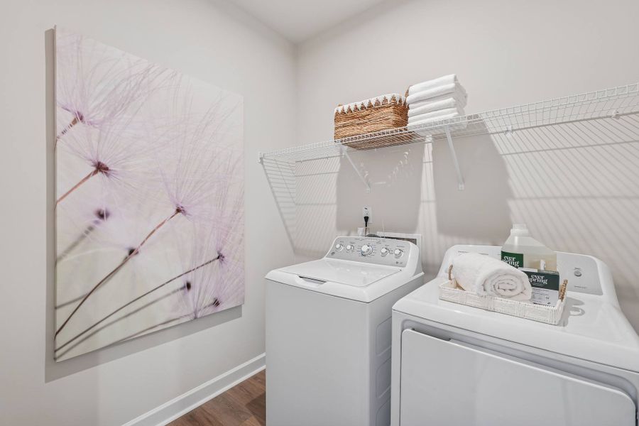 Furnished interior in a model home at Mews at Holding Village in Wake Forest (Image 63).