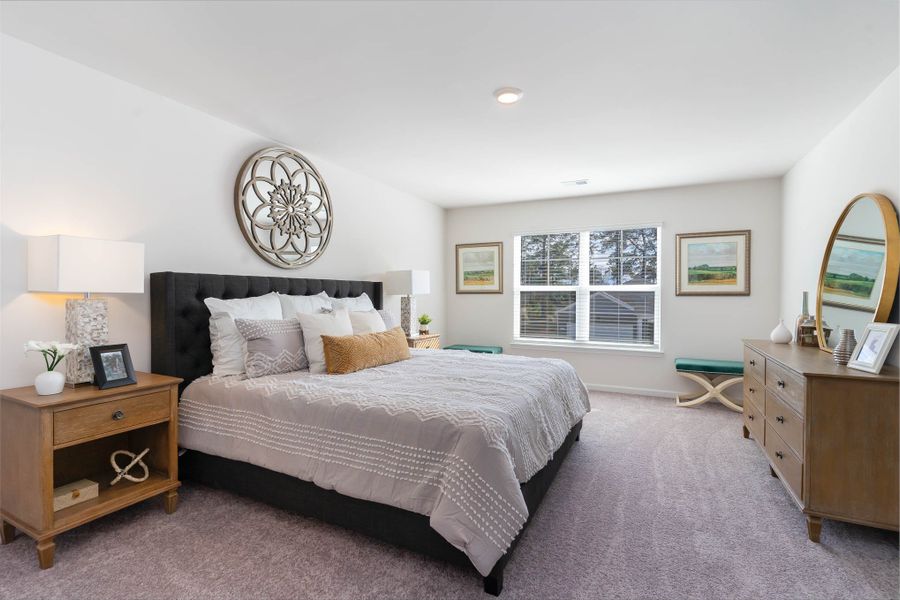Furnished interior in a model home at Island Green in Myrtle Beach (Image 37).