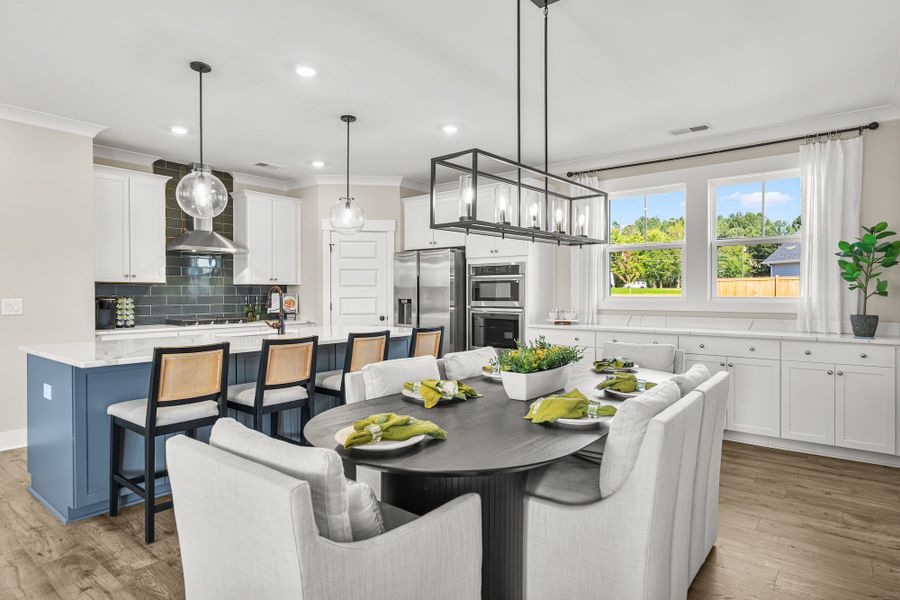 Furnished interior in a model home at Eagle Creek in Central (Image 5).