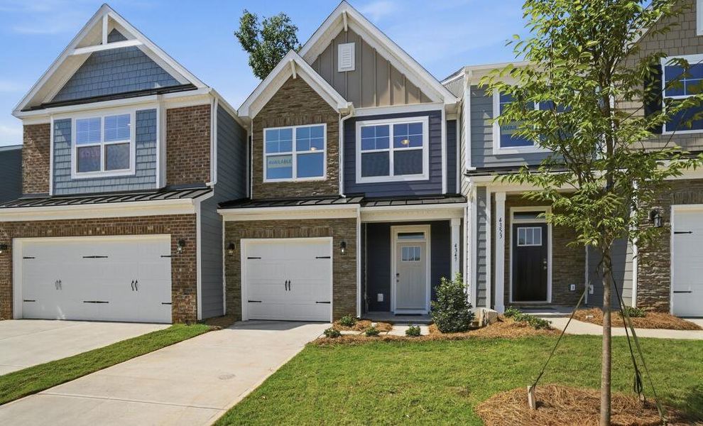 Front exterior of a home in the Harrisburg Village Townhomes community, located in Harrisburg, NC (Image 3). Front exterior of a home in the Harrisburg Village Townhomes community, located in Harrisburg, NC (Image 3).