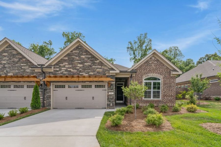 Front exterior of a home in the Weybridge community, located in Burlington, NC (Image 24).