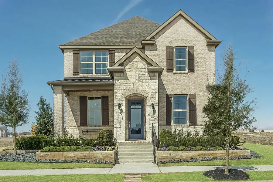 Front exterior of a home in the Wildflower Ranch community, located in Justin, TX (Image 4).