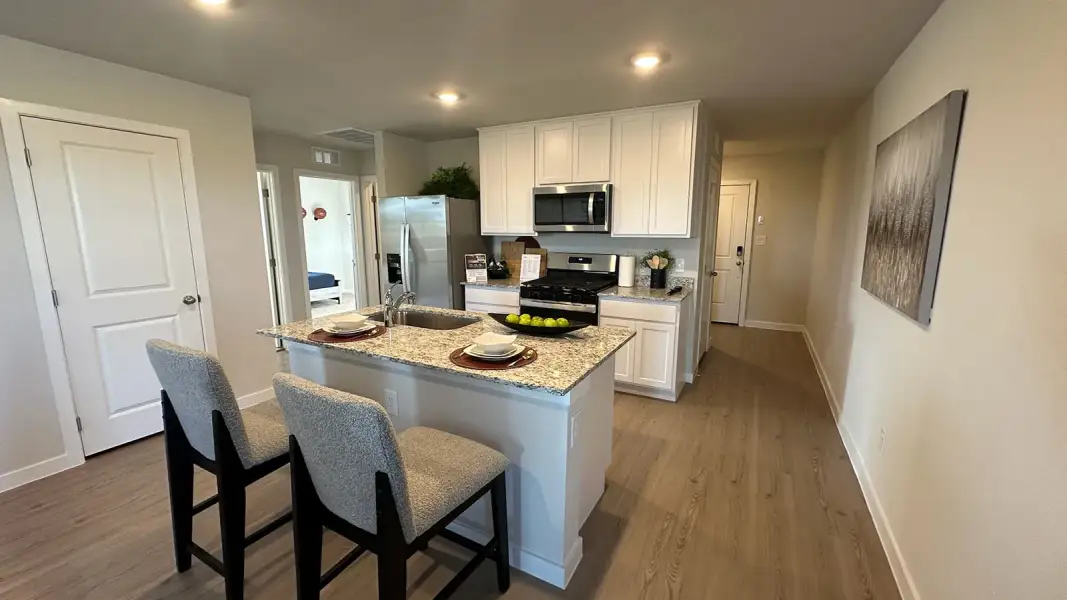 Furnished interior in a model home at Flagstop Crossing in Odem (Image 4).