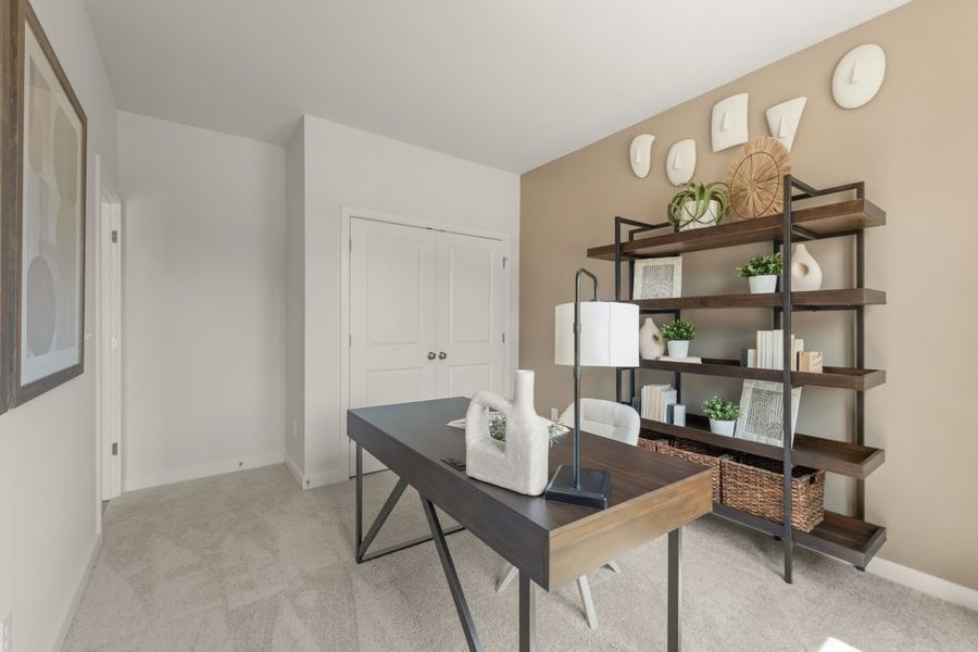 A room with a table and shelves. A room with a table and shelves.