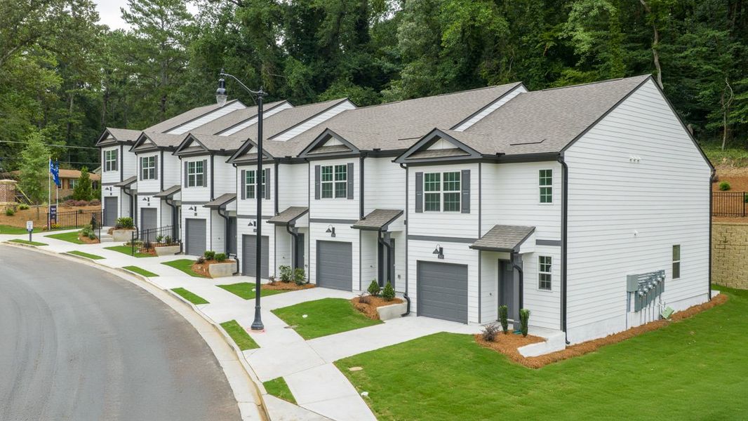 Front exterior of a home in the Wellington Park community, located in Lithonia, GA (Image 2).