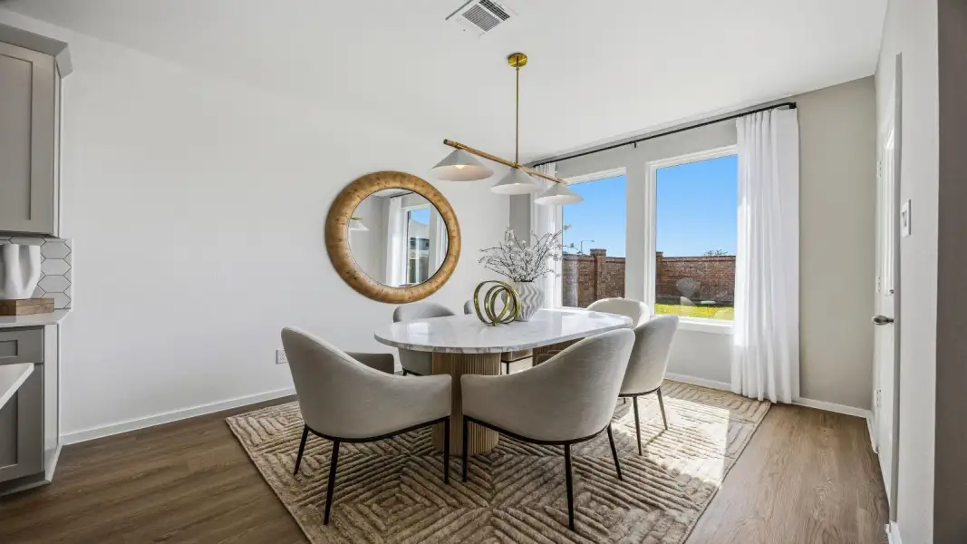 Furnished interior in a model home at Lago Mar 60' Homesites in Texas City (Image 9).