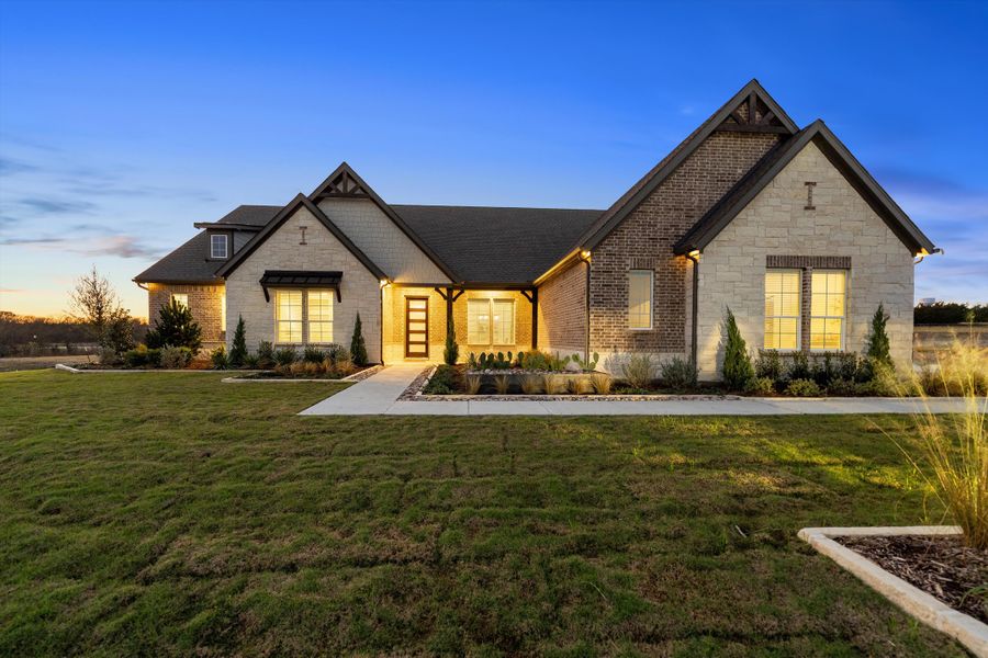 Front exterior of a home in the Grayson Ridge community, located in Van Alstyne, TX (Image 23).