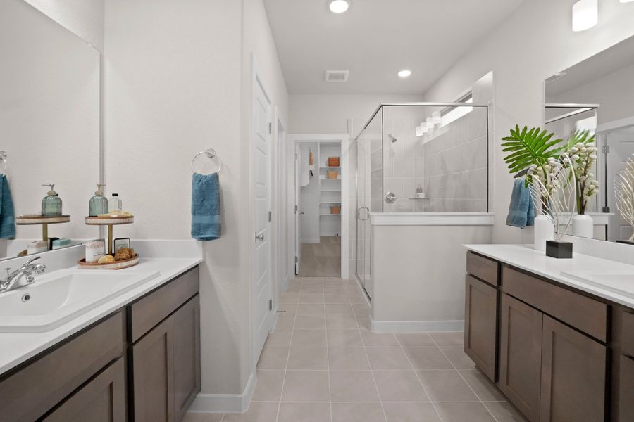 Primary Bathroom in the Lakeside at Tessera Willow model home in Lago Vista TX by Trophy Signature Homes