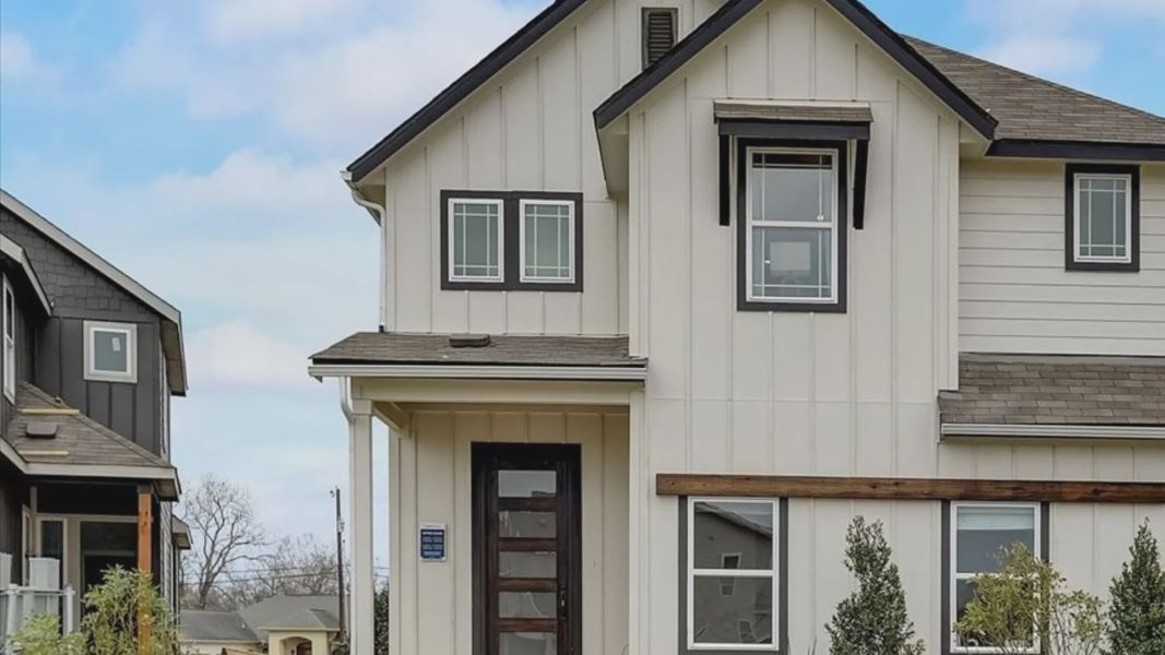 Front exterior of a home in the Casinas at Gruene community, located in New Braunfels, TX (Image 1).
