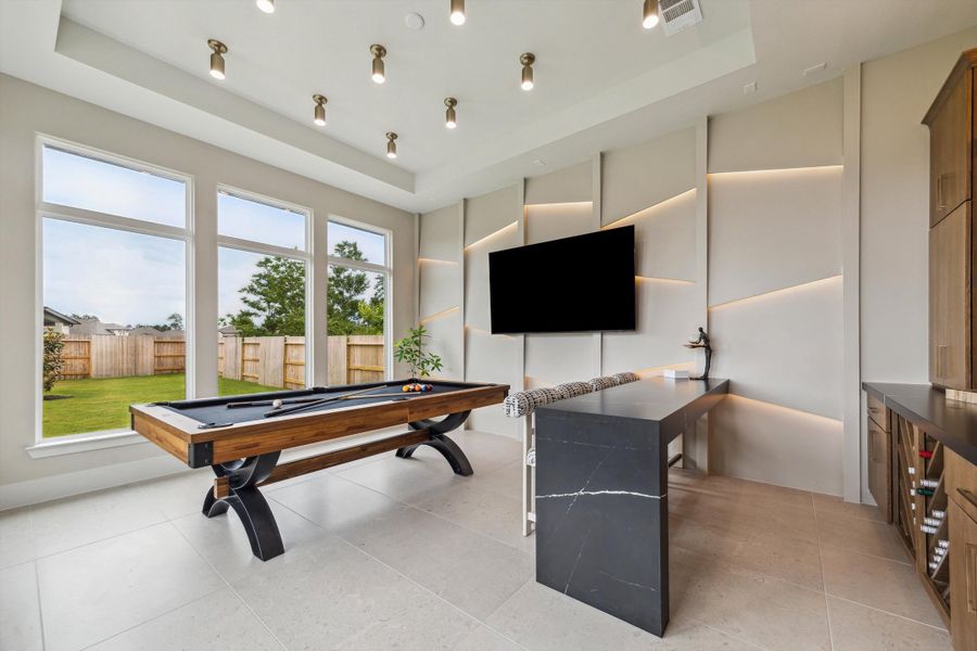 Furnished interior in a model home at ARTAVIA® - 65' Art in Conroe (Image 23).