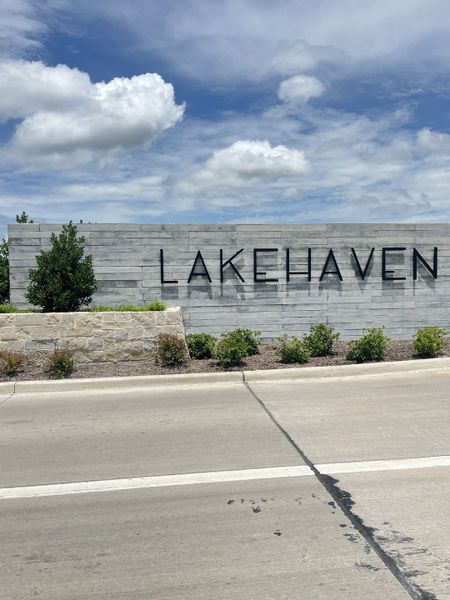 Entrance to Lakehaven community with modern signage and landscaping by Trophy Signature Homes in Farmersville, TX.