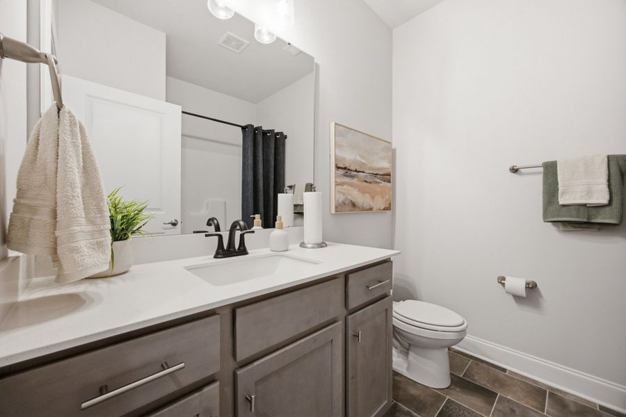 Furnished interior in a model home at Northlake in Statesville (Image 40).