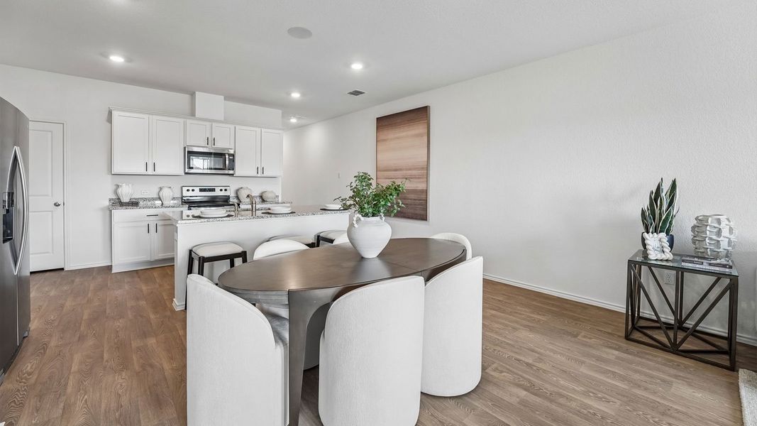 Furnished interior in a model home at Palomino in Manor (Image 20).