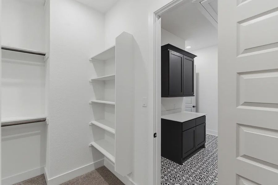 Furnished interior in a model home at Grand Lakes Estates in Montgomery (Image 22).