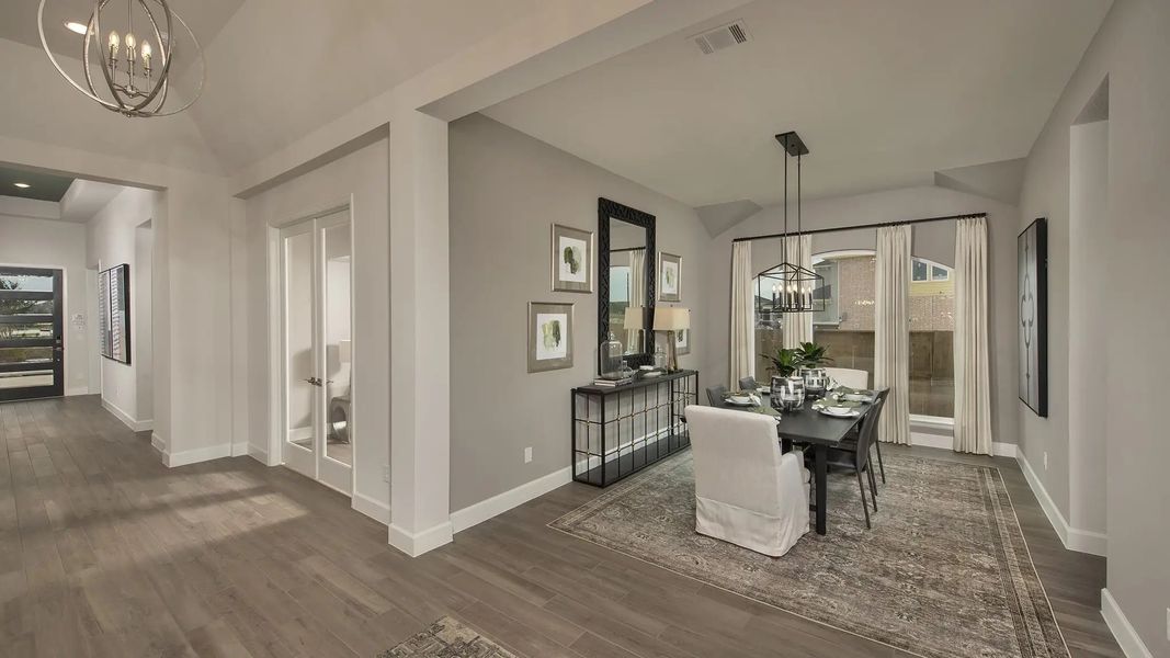 Furnished interior in a model home at Lakes Of Cane Island 55' in Katy (Image 8).