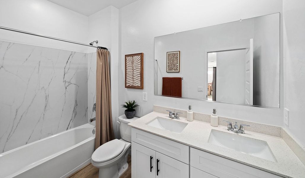 Furnished interior in a model home at Entrada Del Toro at Rancho Sahuarita in Sahuarita (Image 30).