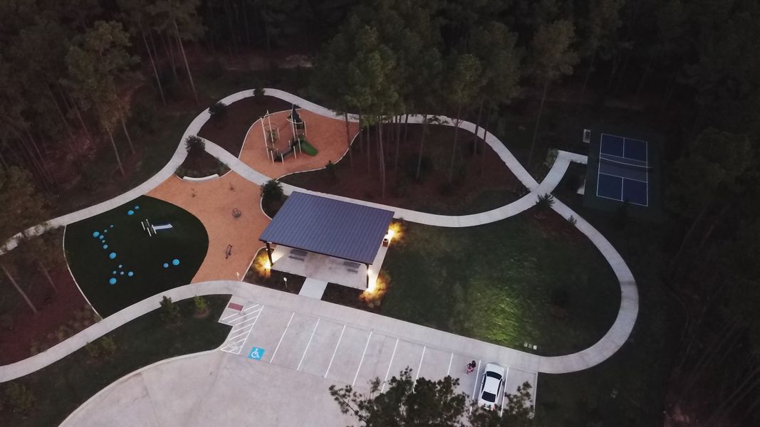 A building with a pool and a large circular pool. A building with a pool and a large circular pool.