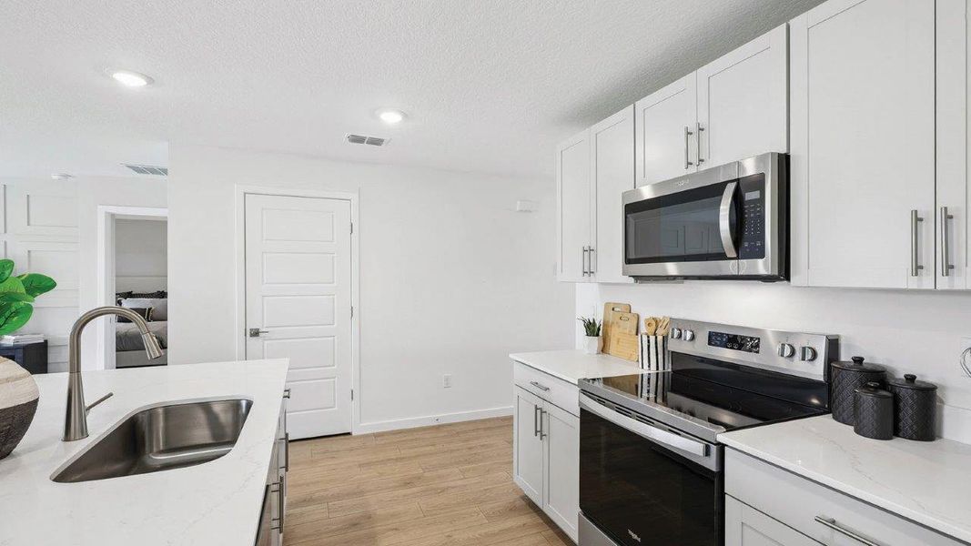 Furnished interior in a model home at Boulevard Oaks in Lady Lake (Image 18). Furnished interior in a model home at Boulevard Oaks in Lady Lake (Image 18).