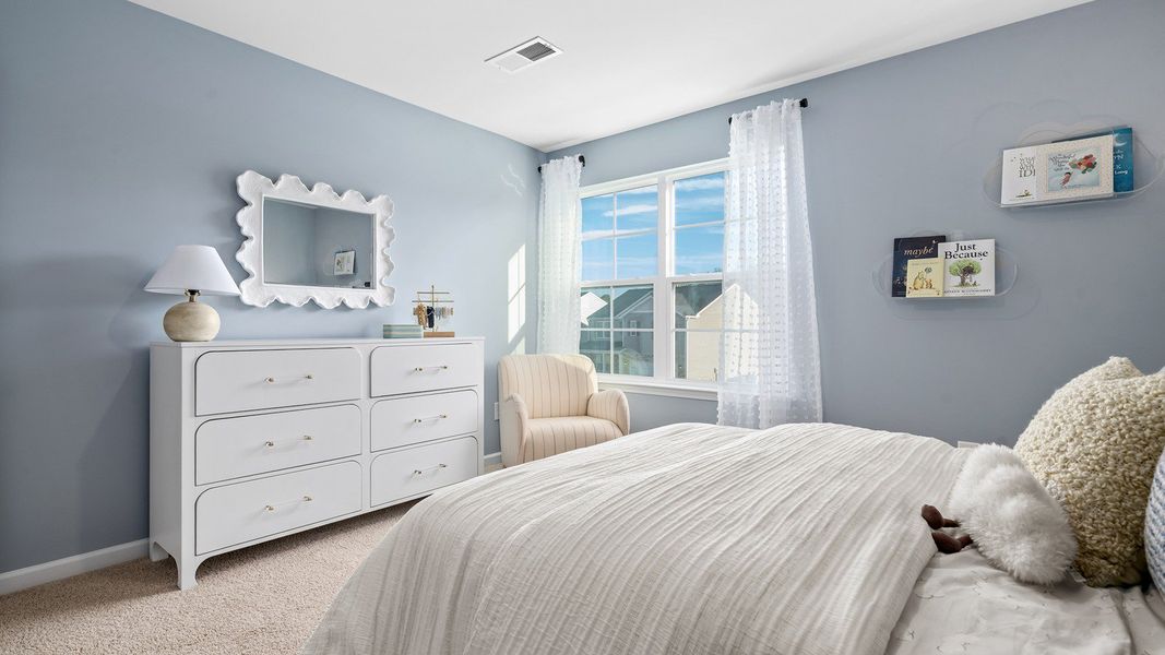 Furnished interior in a model home at The Reserve at Stoney Creek in Whitsett (Image 26).