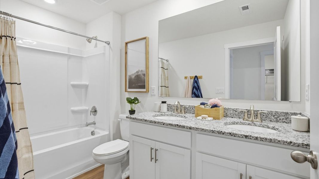 Furnished interior in a model home at Price's Point in Knoxville (Image 36).