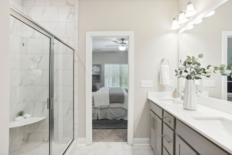 Furnished interior in a model home at Rourk Woods in Shallotte (Image 18).