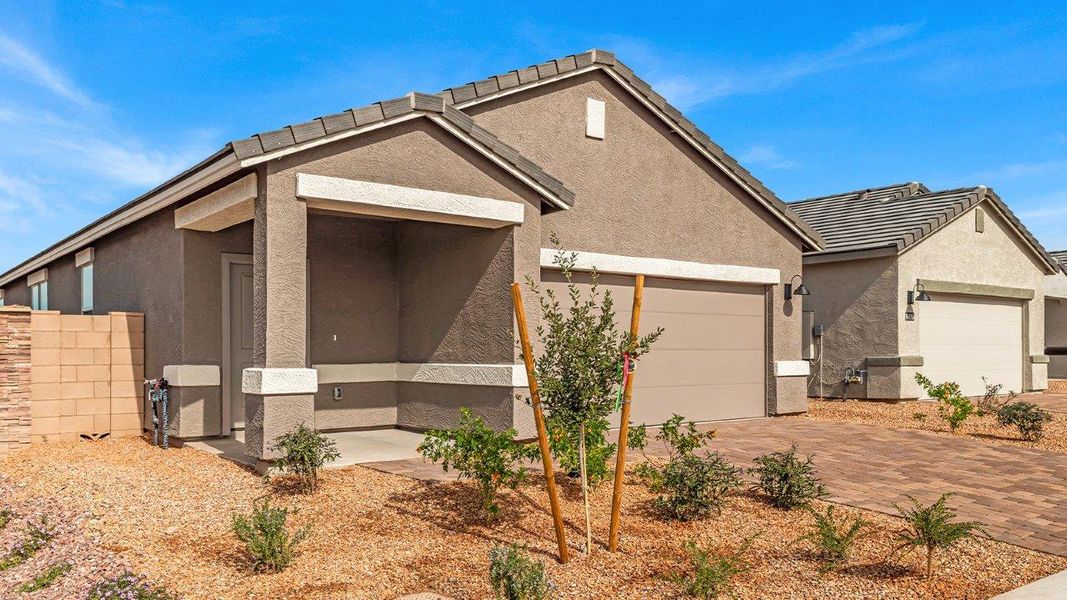 Front exterior of a home in the Coronet at Gladden Farms community, located in Marana, AZ (Image 42).