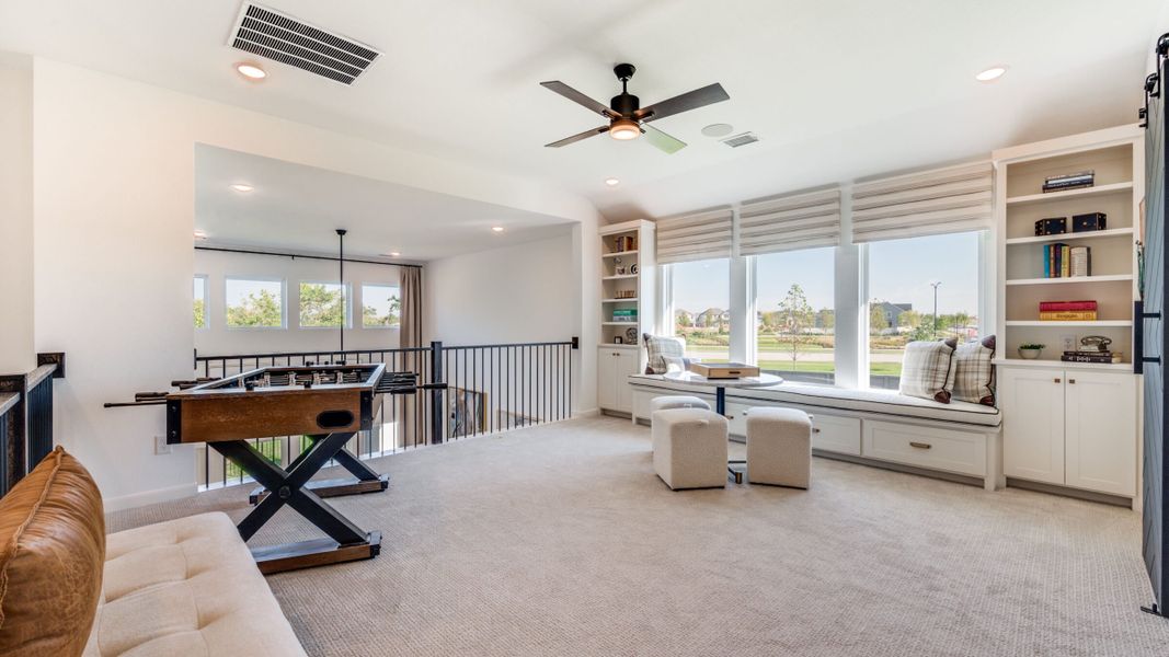 Furnished interior in a model home at Painted Tree - South in McKinney (Image 30).