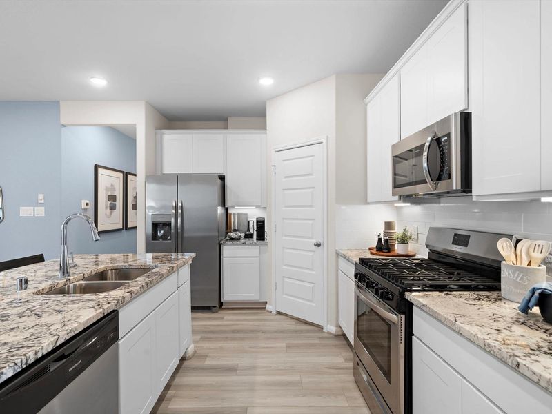 Furnished interior in a model home at Lakes at Black Oak in Magnolia (Image 19).