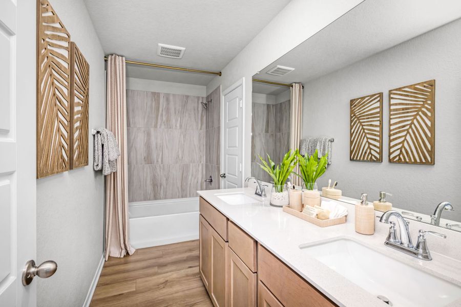 Furnished interior in a model home at Applewhite Meadows in San Antonio (Image 50).