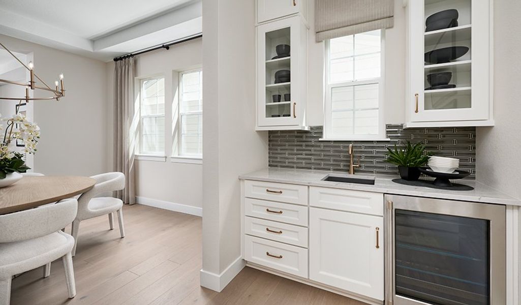 Furnished interior in a model home at Chateau at the Meadows in Castle Rock (Image 6).