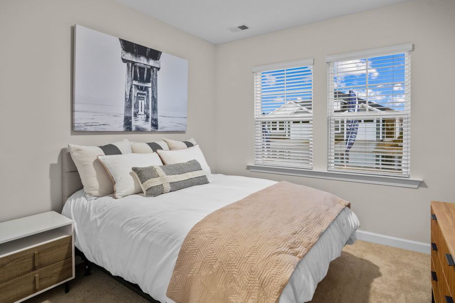 Furnished interior in a model home at The Paired Villas at Bridgewater in Little River (Image 19).