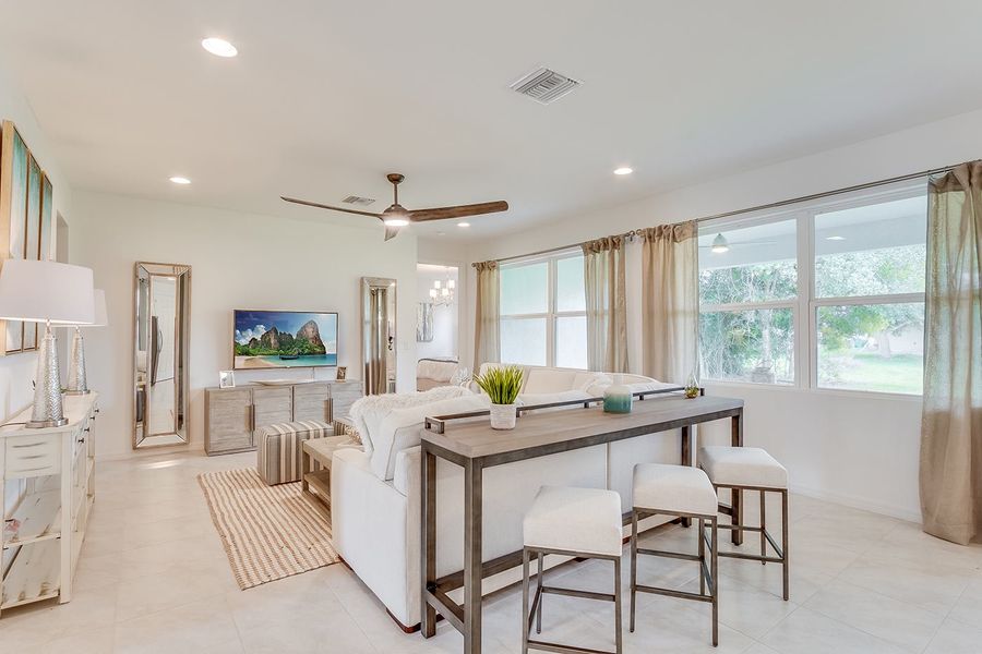 Furnished interior in a model home at Deep Creek Tradition Series in Punta Gorda (Image 12).